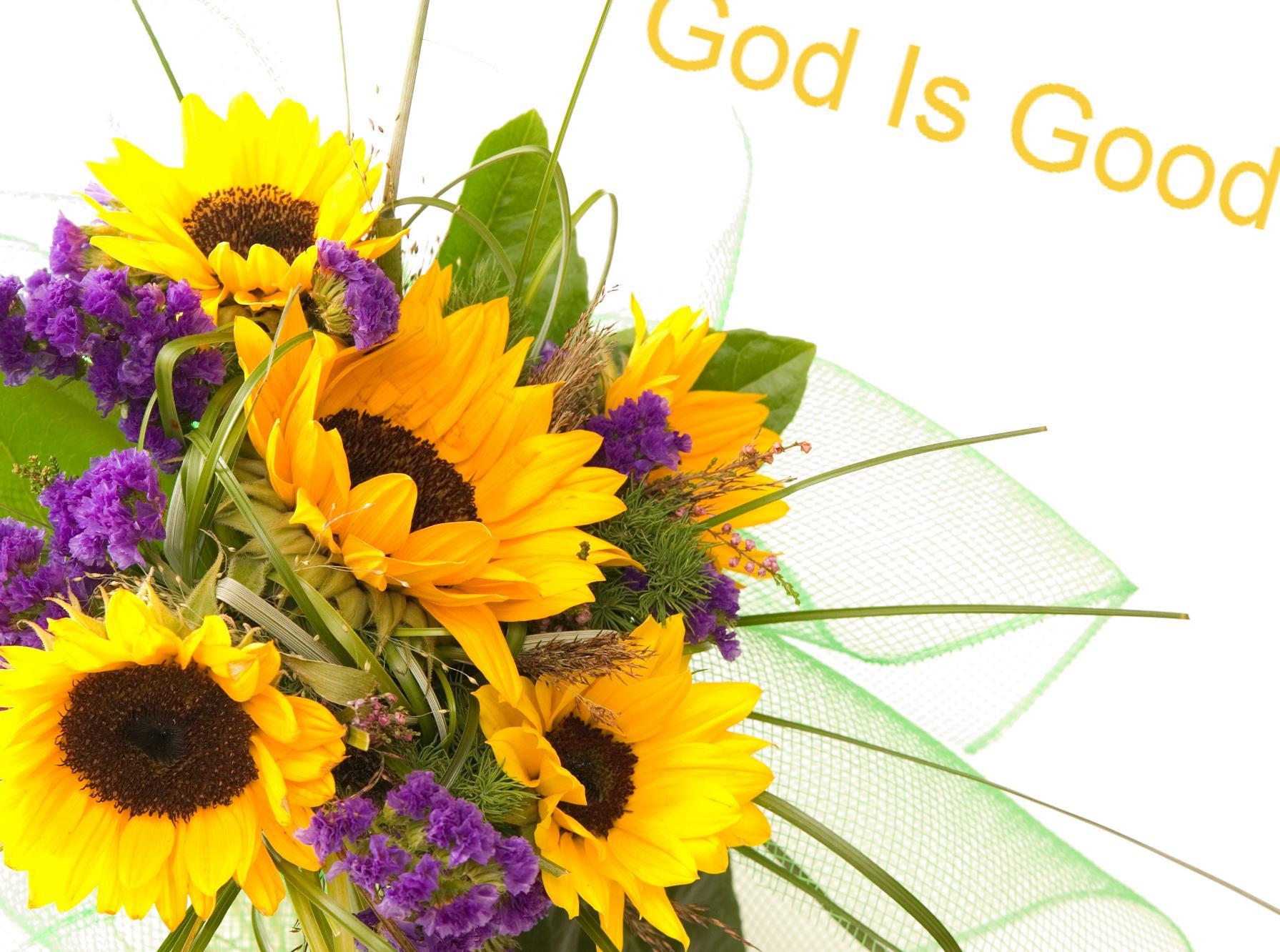 God is good inscription on a flower