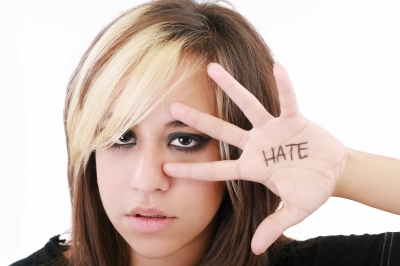 lady showing hate signs
